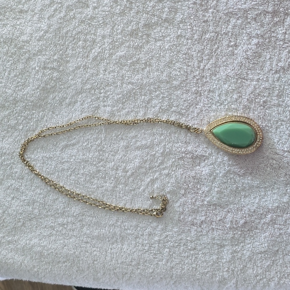Gold Tear drop necklace with jade color stone.